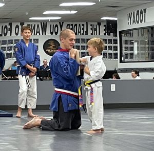 Students getting ready to break a board 