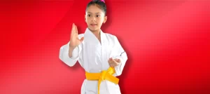 child practicing karate