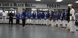 black belts bowing