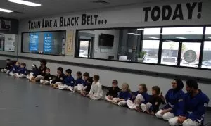 students waiting at promotion ceremony 