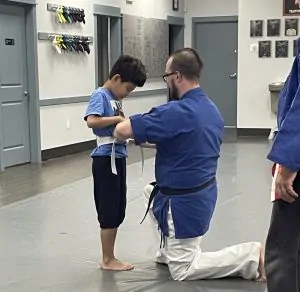 Student Earning their White Belt